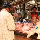 Butcher at Kampot market, Cambodia